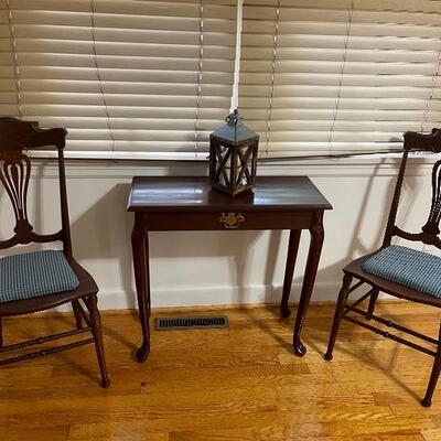 Table and antique chairs