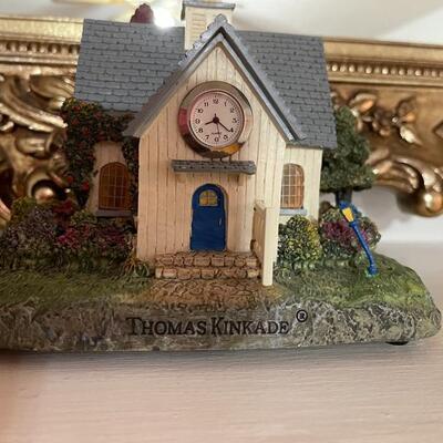 Thomas Kincaid cottage with clock