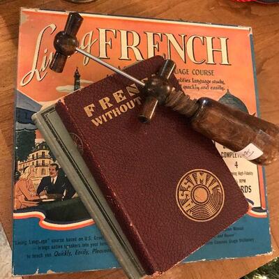 French records, books and cork screws