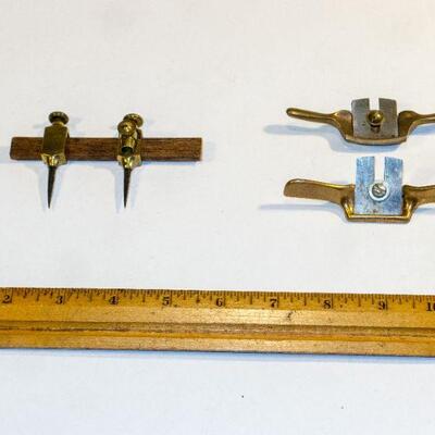 unmarked brass trammel points and spokeshaves
