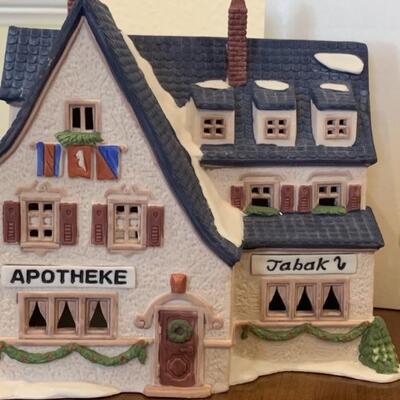Heritage Village Collection, Village, Set 2 of 8
Hand Painted Porcelain from Dept 56
From the Alpine Village Collection - 'Apotek and...