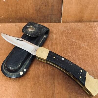 Buck Knife with Sheath Marked 110 USA