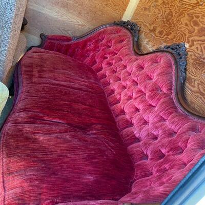 Antique red velvet sofa 