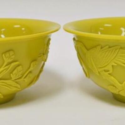 1007	PAIR OF YELLOW GLASS CHINESE CAMEO BOWLS TWO DIFFERENT DESIGNS, ONE W/ A BIRD. 8 IN DIAMETER, 3 1/4 IN H
