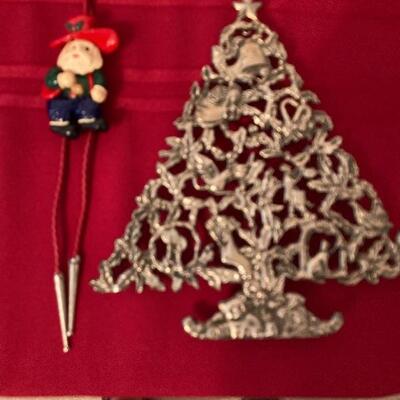 Santa bolo tie and Christmas tree brooch.