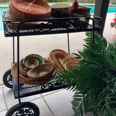 Metal serving cart and woven baskets