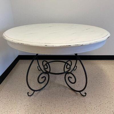 Antique White Round Wood Table with Decorative Metal Base.  47