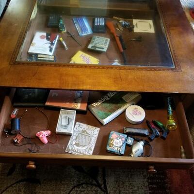 Coffee/Curio table with glass top & drawers