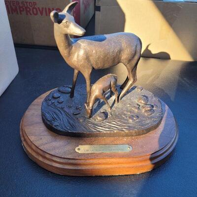 Another solid bronze sculpture, this one of a deer and her fawn. Very good condition