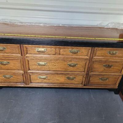 Very nice triple dresser, this is the one that goes with the mirror in another picture. Very good condition, see pictures for details