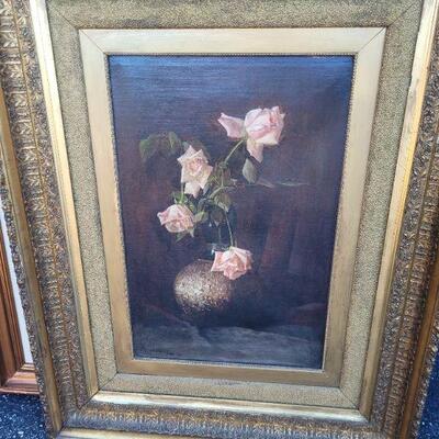 Very old painting that has a very ornate frame. Painting is in very good condition, frame shows normal wear