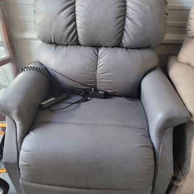 This is a grey, recliner/lift chair. Very good condition, no rips, tears or stains on the fabric. See pictures