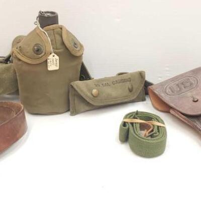 #2700 • Antique Smith & Wesson Belts Buckle, Vintage U.S. Army Canteen, Holster, Gun Cleaning Kit, and More
