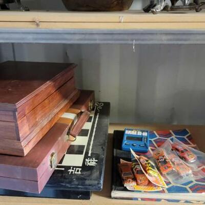 #5502 • Games, Toy Cards, Chess Pieces and Airplane Book.