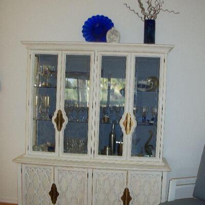 Continental Furniture Co. White China Hutch ; Crystal and Decor items.
