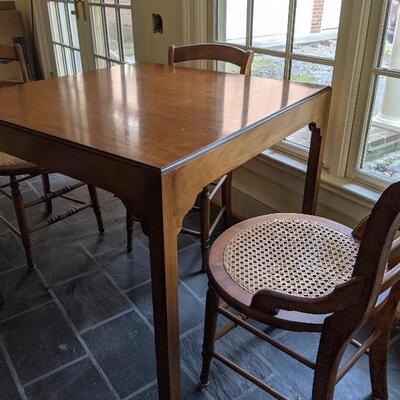 Card table, caned seat chairs