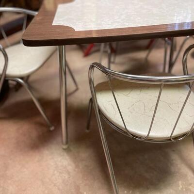 Retro childâ€™s Formica table & 4 chrome chairs.