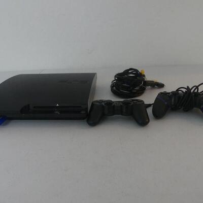Sony PlayStation 3 with 2 Controllers, RCA and Ethernet Cables 