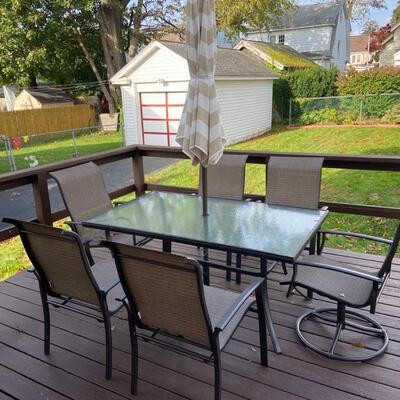 Patio set -- glass table and 6 chairs, umbrella