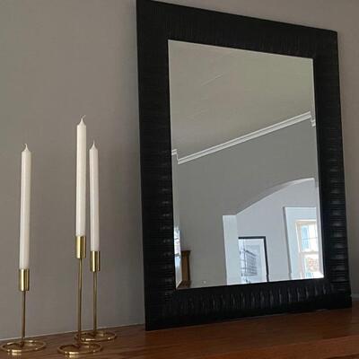Triad of brass candles with mantle mirror