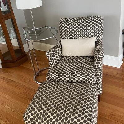 Upholstered wingback chair with ottoman