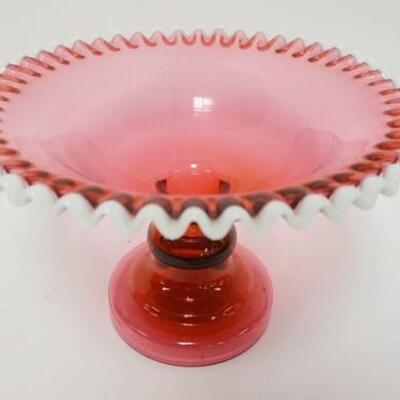 1085	LARGE CRANBERRY GLASS COMPOTE W/APPLIED WHITE RIM, TIGHTLY CRUMPED EDGE, 12 1/2 IN DIAMETER X 7 3/4 ON HIGH
