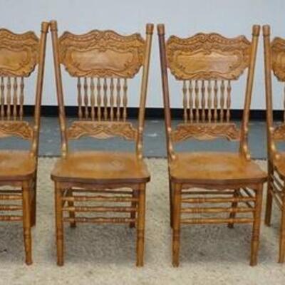 1044	SET OF 6 CONTEMPORARY PRESS BACK OAK CHAIRS, 2 ARM & 4 SIDE, ONE BACK LEG OF A SIDE CHAIR HAS BEEN REPAIRED
