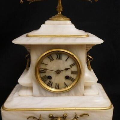 1039	FRENCH MARBLE MANTLE CLOCK HAVING AN URN SHAPED CREST W/MOUNTED BRONZE ACCENTS, 10 IN X 13 IN HIGH
