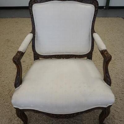 1051	CARVED UPHOLSTERED ARM CHAIR, 29 IN WIDE X 39 IN HIGH
