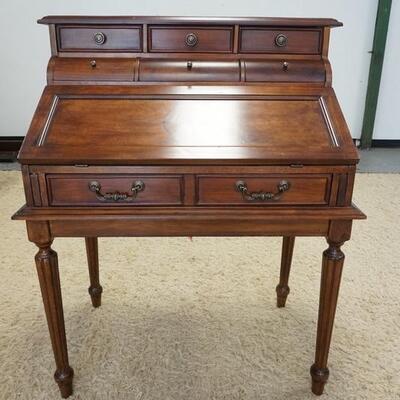 1042	INLAID SLANT FRONT DESK W/FLUTED LEGS, HAS 7 DRAWERS & INTERIOR DRAWERS, 36 IN WIDE X 45 1/4 IN HIGH X 22 IN DEEP
