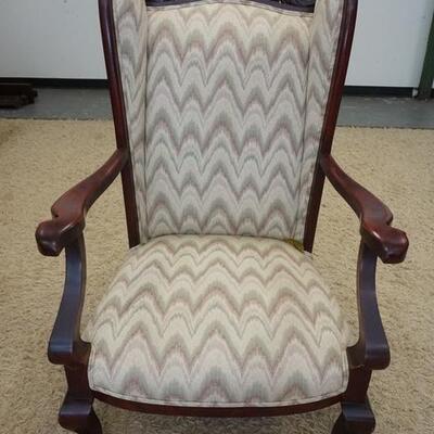 1049	CARVED UPHOLSTERED WING BACK ARM CHAIR, CLAW FEET, 30 1/2 IN WIDE X 45 IN HIGH
