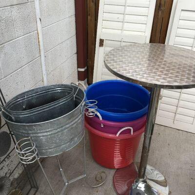 Plastic Beverage Tubs $10 each/3
Tall steel table and metal tub have been sold
