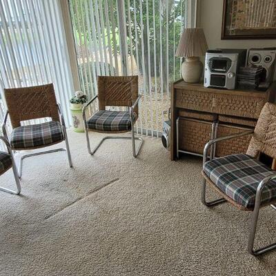 four matching chairs can be for a dinette table or lanai, rattan desk sold also