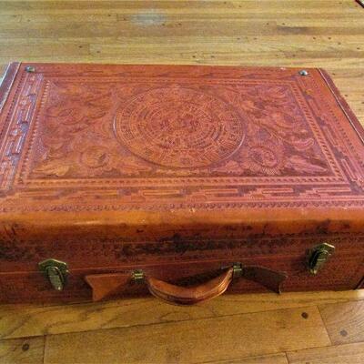 Hand tooled leather suitcases