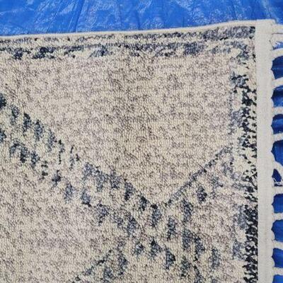 Blue geo rug with tassel 
6 x 9 
Cream sculpted rug 
8x10
$399