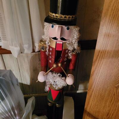 This is a beautiful nutcracker that stands over 4 foot tall, it also has lights that flash and change color on the jacket buttons and the...