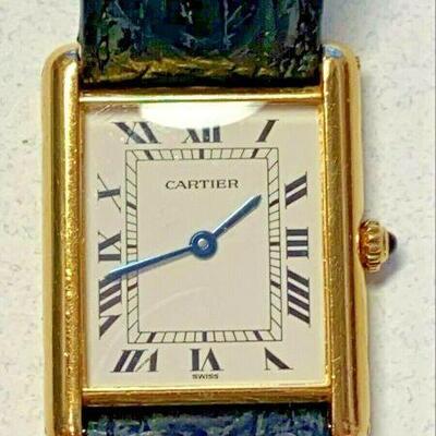 https://www.ebay.com/itm/125060423545	NC595 CARTIER WATCH 18K GOLD, UNTESTED		 BIN 	 $3,499.99 
