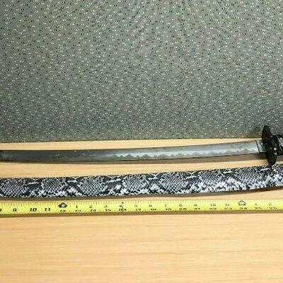 https://www.ebay.com/itm/124994360021	KB0229 Japanese Katana Black and White Snakeskin Prop Sword 75cm LOCAL PICKUP		BIN	 $39.99 
