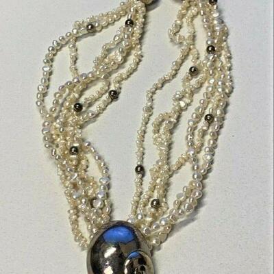 https://www.ebay.com/itm/115131459292	NC586 MIGNON FAGET LARGE STERLING SILVER SHELL AND PEARLS NECKLACE		Auction
