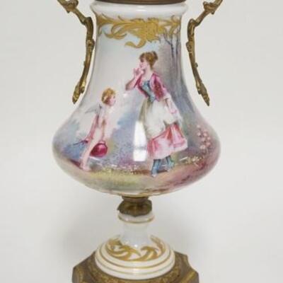 1046	SEVRES HAND PAINTED BOLTED URN W/BRASS MOUNTS, LADY & CHERUB W/SCENEIC REVERSE, 10 3/4 IN HIGH
