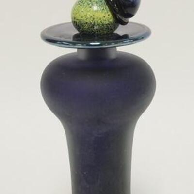 1043	MODERN ART GLASS BOTTLE W/STOPPER, HAS AN ABSTRACT FISH STOPPER, SIGNED W/INITIALS & DATED 1995, 12 IN HIGH
