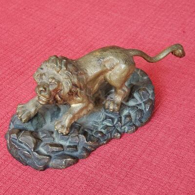 Bronze lion paperweight