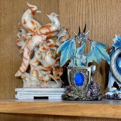 Several dragon figurines...