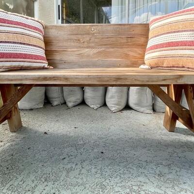 Wooden bench that converts to a picnic table
