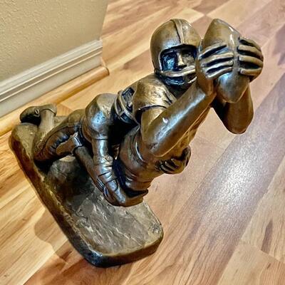 Large sculpture of football players