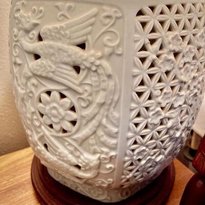 Reticulated Porcelain Blanc de Chine Ginger Jar Lamp (there are two of them, one on either end of the cabinet) The interior light comes...