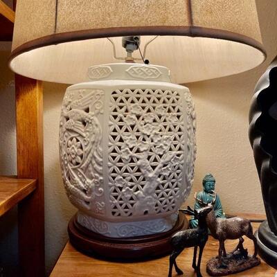 Reticulated Porcelain Blanc de Chine Ginger Jar Lamp (there are two of them, one on either end of the cabinet) The interior light comes...