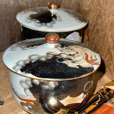 Japanese Dragonware Teapot with matching cream and sugar bowls with lids. Signed on bottom.
