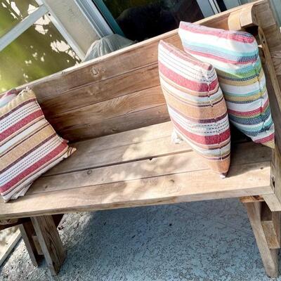 Wooden bench that converts to a picnic table