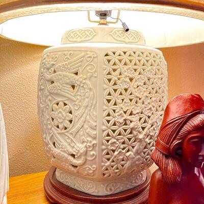 Reticulated Porcelain Blanc de Chine Ginger Jar Lamp (there are two of them, one on either end of the cabinet) The interior light comes...